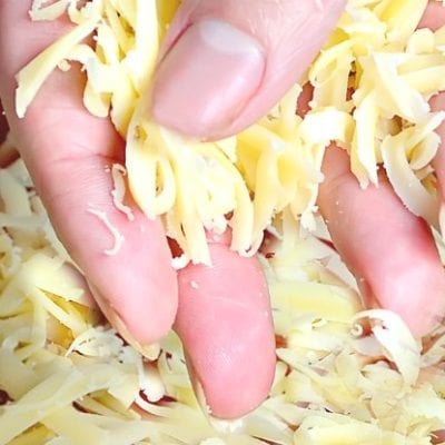 hand cheese grated