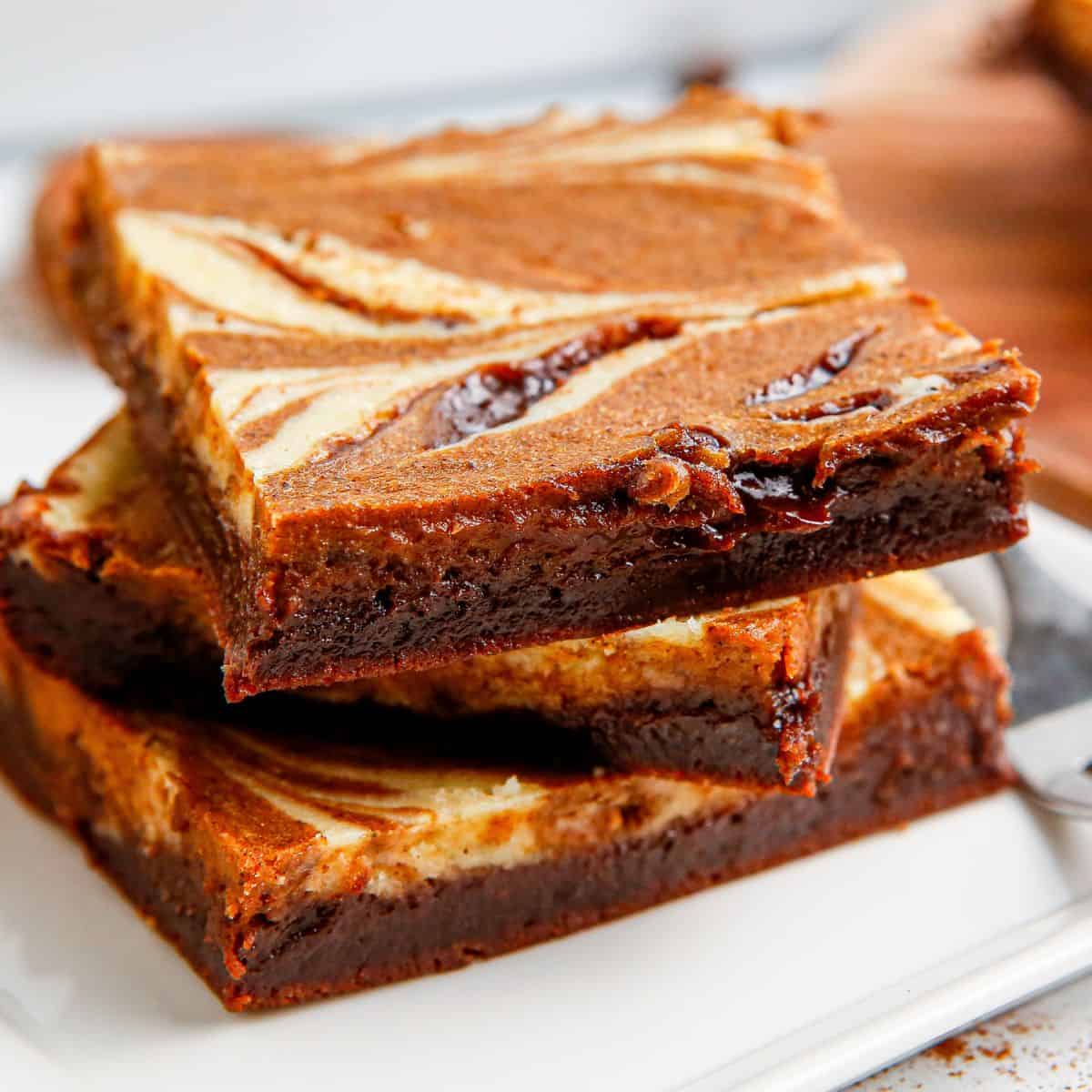Sugar Free Pumpkin Swirl Brownies, a delicious dessert or snack recipe made with a pumpkin cream cheese swirl topping. Keto Low Carb