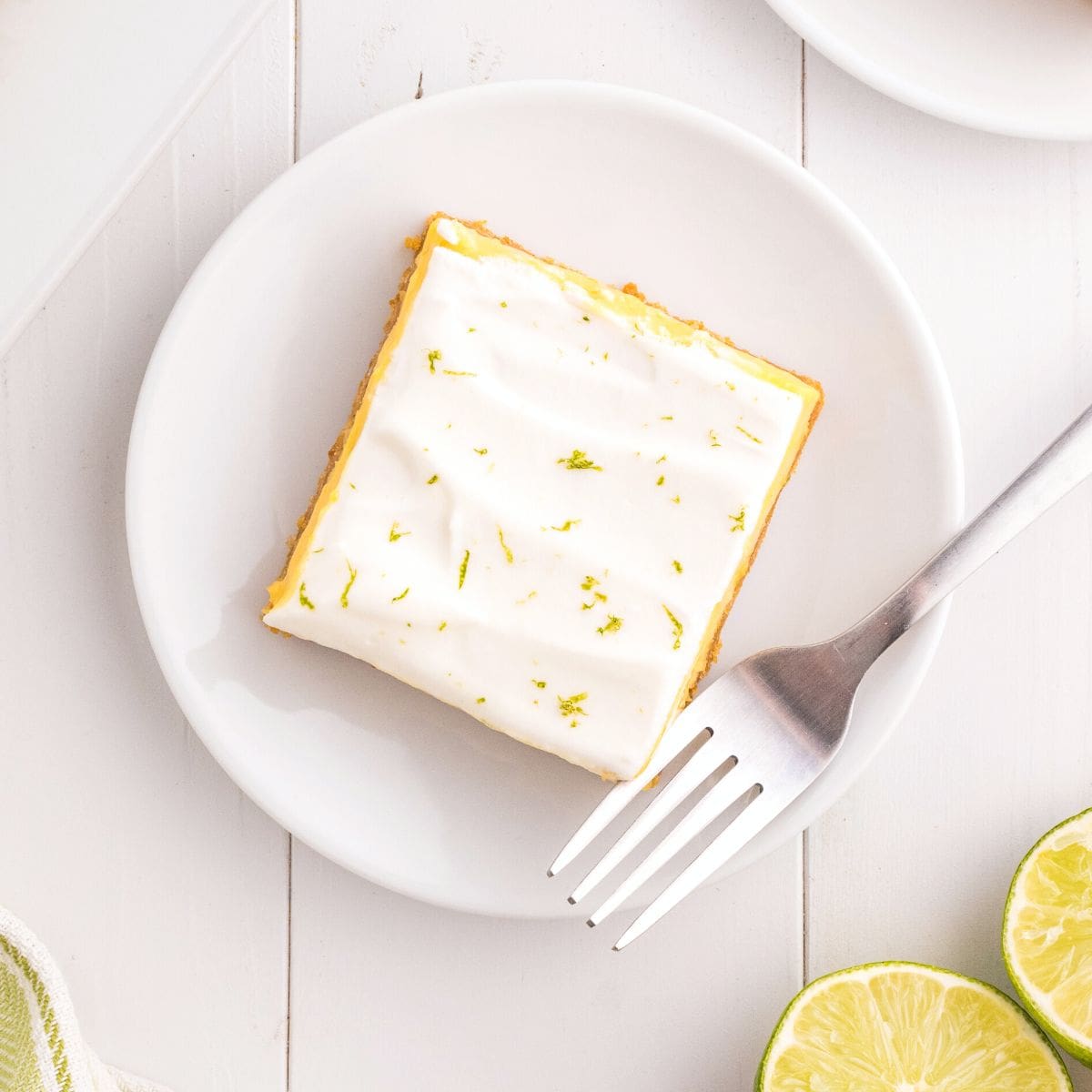 Sugar Free Key Lime Bars, a delicious layered dessert recipe made with a creamy tart filling on a buttery crust with no added sugar.