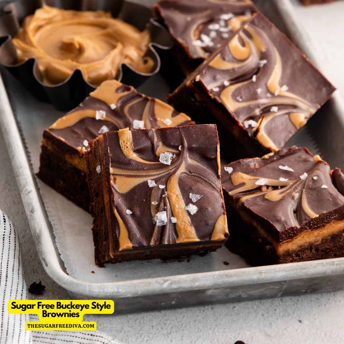 Sugar Free Buckeye Style Brownies a delicious layered dessert recipe made with a brownie base, peanut butter layer, and ganache topping.