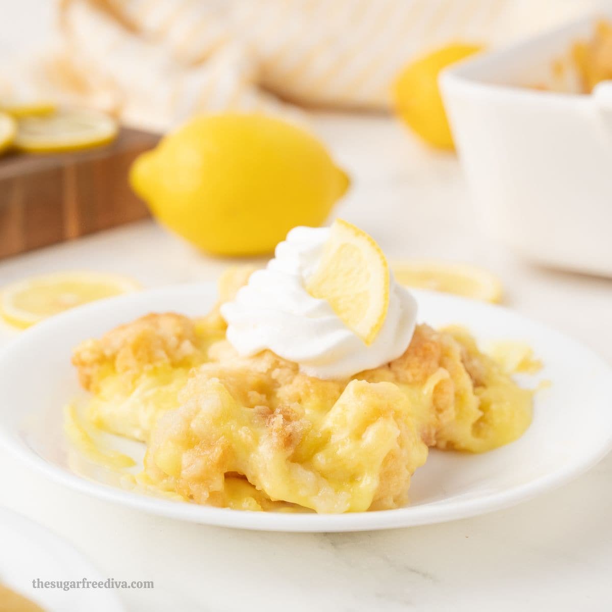 Sugar Free Lemon Cream Cheese Dump Cake, an easy no added sugar dessert recipe made with cake mix, pudding, and cream cheese.