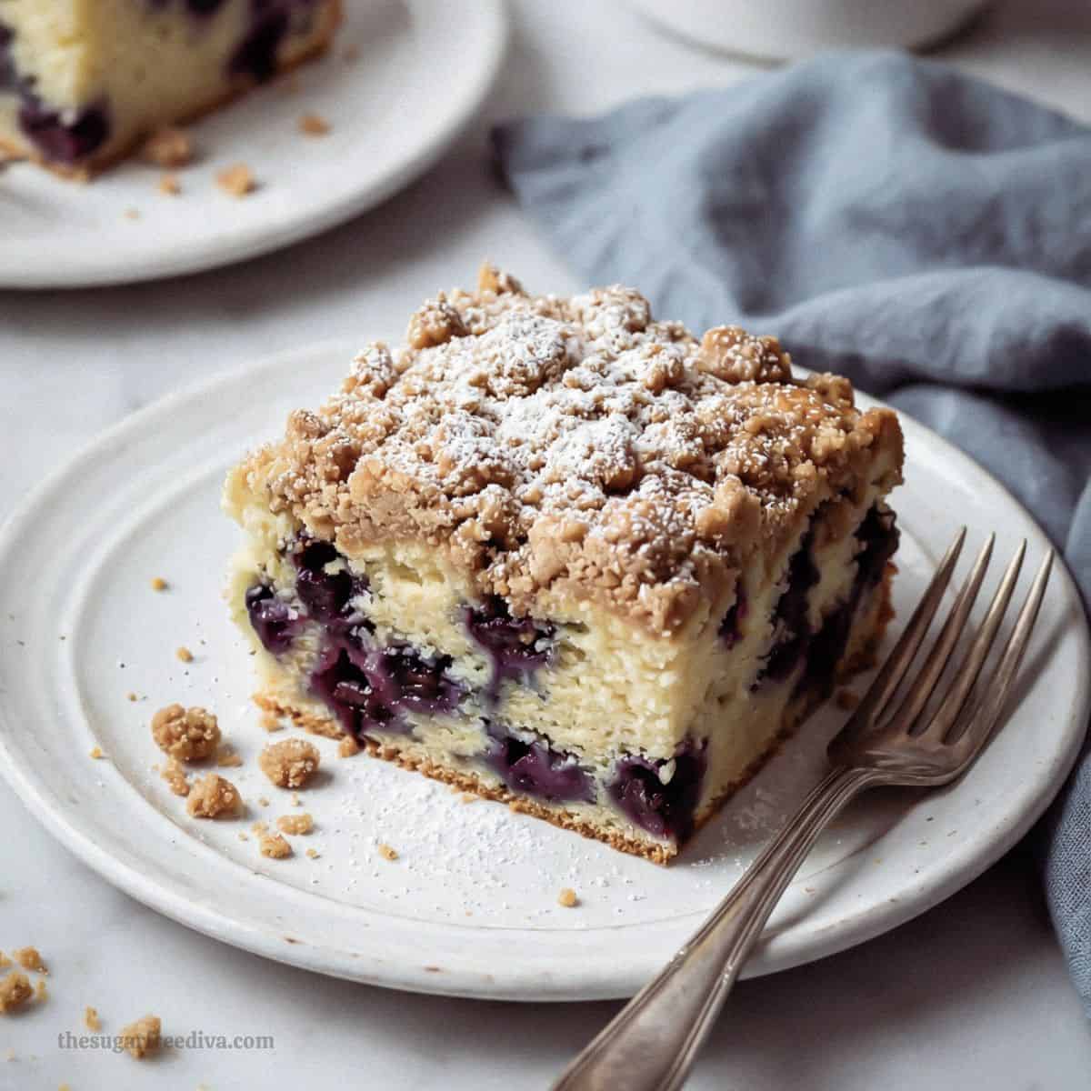 Moist and tender sugar free blueberry coffee cake made with fresh blueberries and a buttery cinnamon streusel topping. Perfect for breakfast, brunch, or dessert. Sugar Free Blueberry Coffee Cake, an easy no added sugar breakfast cake packed with juicy blueberries with a sweet cinnamon streusel topping.