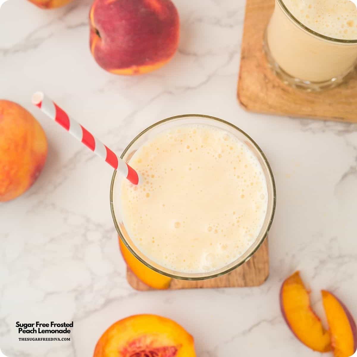 This Sugar Free Frosted Peach Lemonade is the ultimate creamy summer drink! Made with fresh peaches, all natural lemonade, and vanilla ice cream, it’s sweet, refreshing, and easy to make at home. Perfect for BBQs, pool days, and summer parties! Sugar Free Frosted Peach Lemonade made with fresh peaches, natural lemonade, and creamy vanilla ice cream. Refreshing and easy recipe!